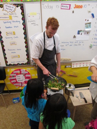 Chef Stuart making stir-fry for the students